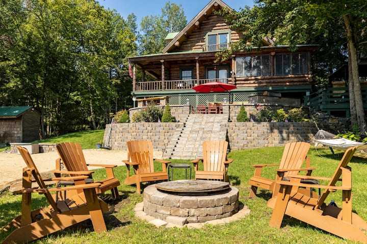 Stunning lakefront NH log home with private beach
