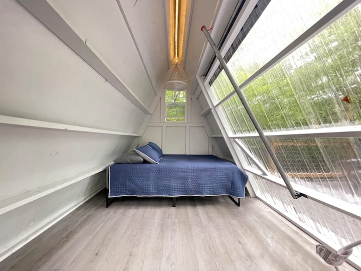 Queen size memory foam mattress, adjustable ceiling fan, and LED lights all running on solar power!