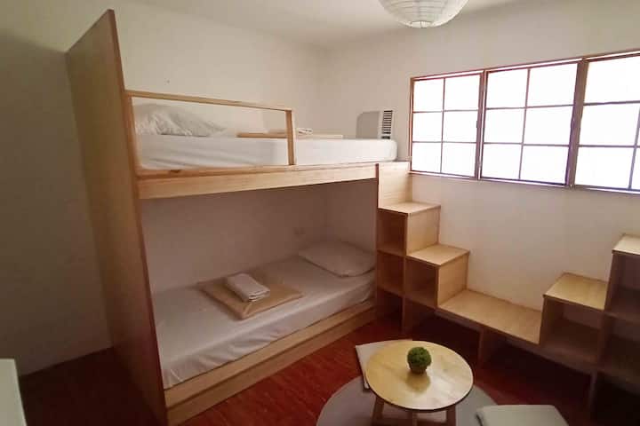 Say goodbye to floor futons and hello to our newly installed built-in bunk beds in the big bedroom!
