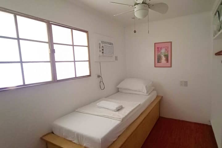 Say goodbye to floor futons and hello to this new bed with a pull-out trundle bed in our small bedroom.