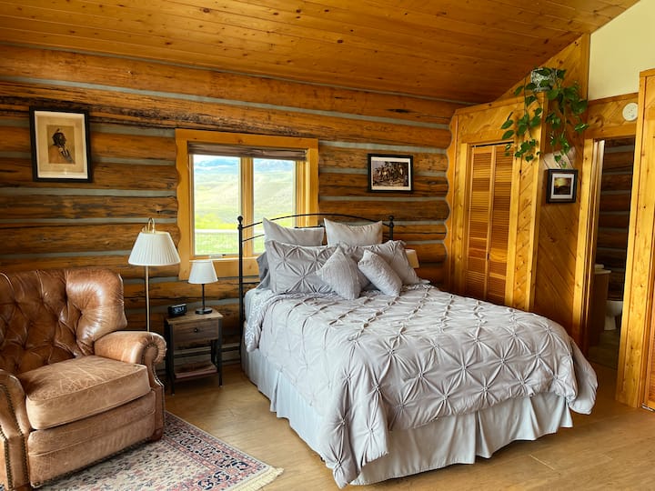 Queen bed with leather recliner