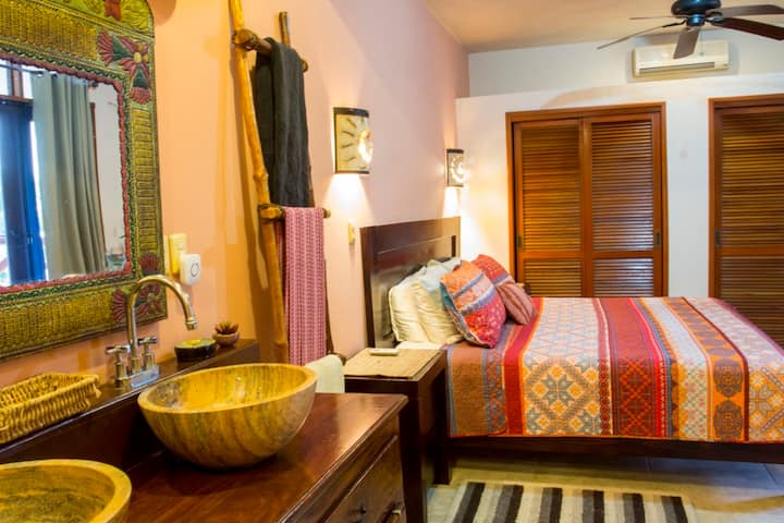 master bedroom and bathroom