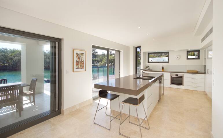 Canalfront Retreat: Private Jetty & Pool gallery image 3