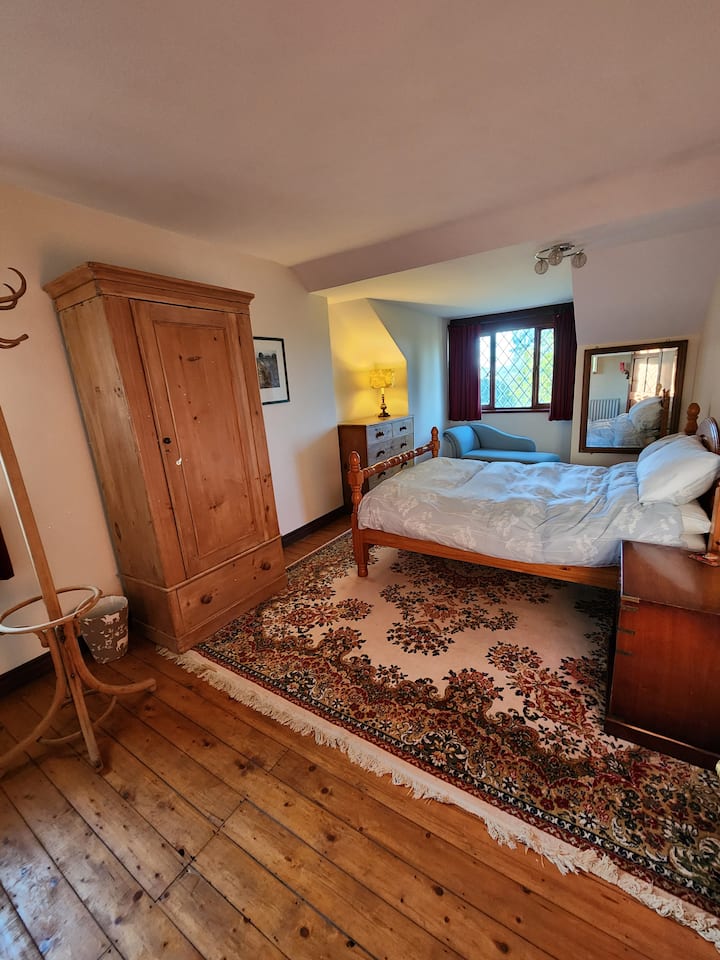 Double Bedroom, 
Chaise lounge overlooking the countryside