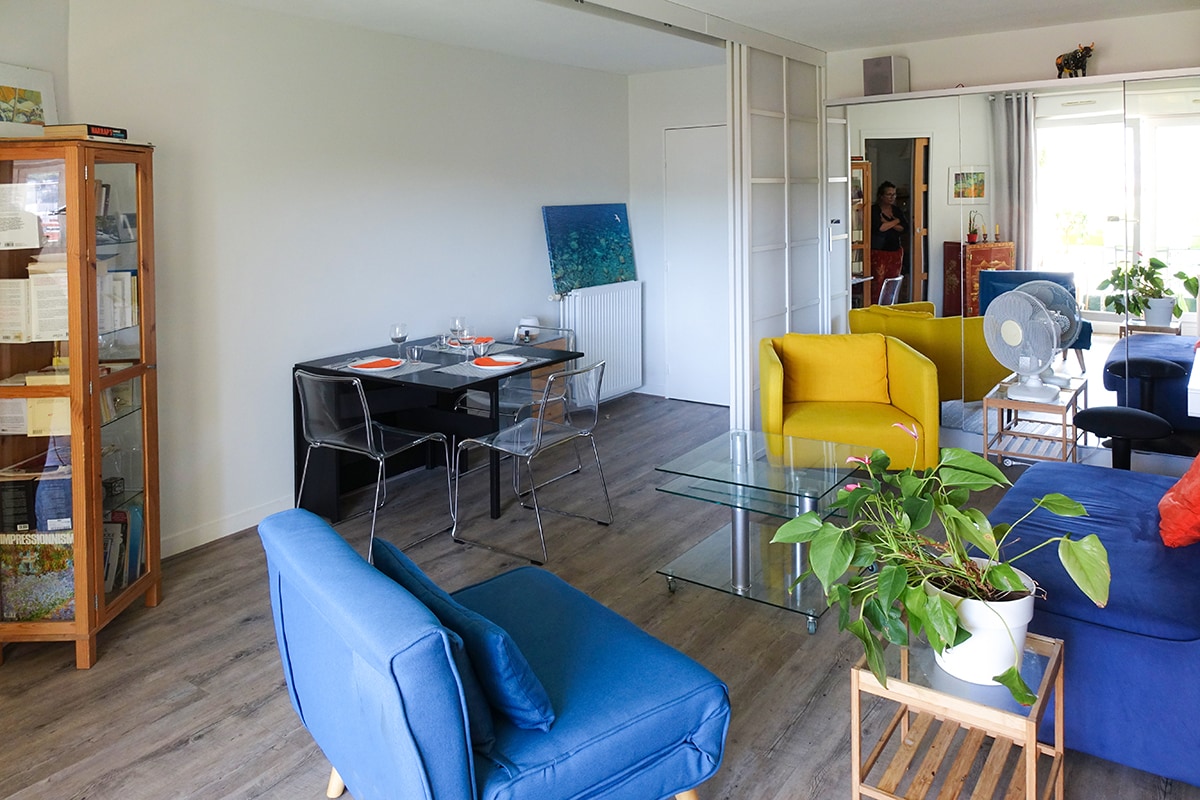 The living room when the alcove is not gated and the dining area.