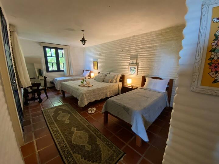 Suite 4 principal - cama tamaño king + 2 camas individuales