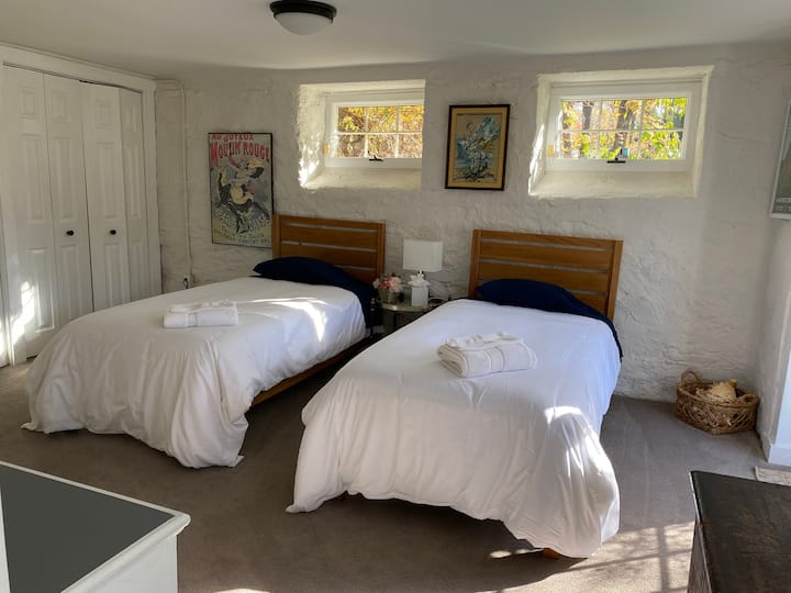 First downstairs guest bedroom. Stairs needed to access.