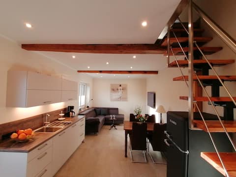 Leistungsstarkes Airbnb: High-quality top apartment on the lake in Mecklenburgische Seenplatte