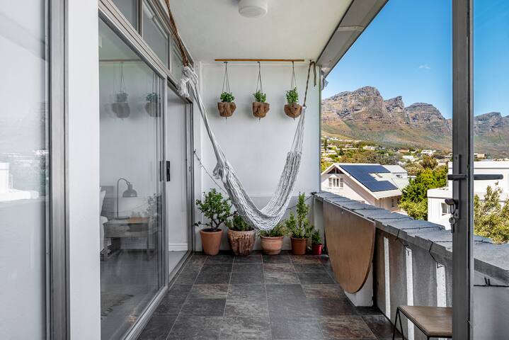 Bright, spacious apartment on Camps Bay beach! gallery image 4