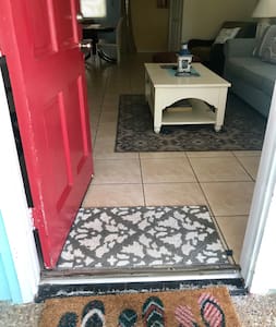 No steps to enter -front door 35.5 inches wide ! 
Welcome to siesta beach beach cottage!! 