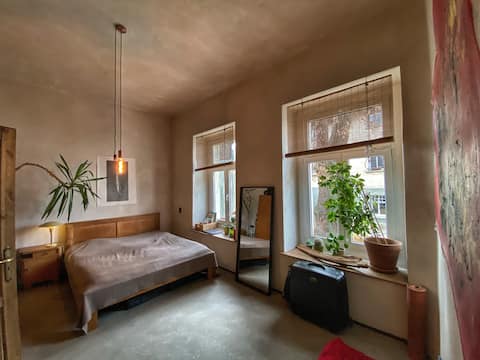 Cosy flat with a piano and lots of plants