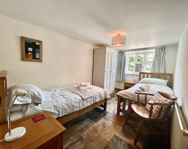 Habitación doble con dos dormitorios.