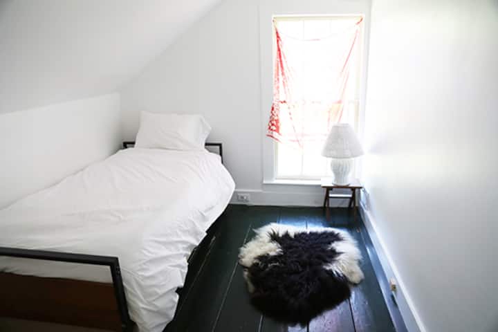 Little Prince room with trundled single bed. Great for kids!