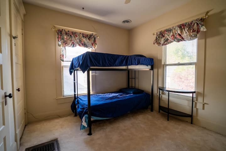 Kids room with bunk beds.