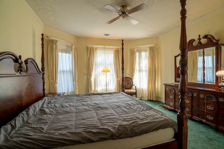 Second floor bedroom and king bed.