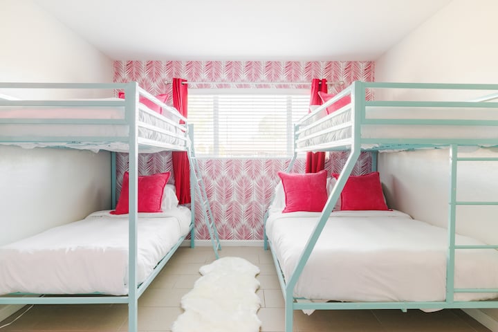 Bedroom #2 features a twin over twin bunk bed + twin over full bunk bed. Each bed has a high end memory foam mattress with super soft pillows & linens.