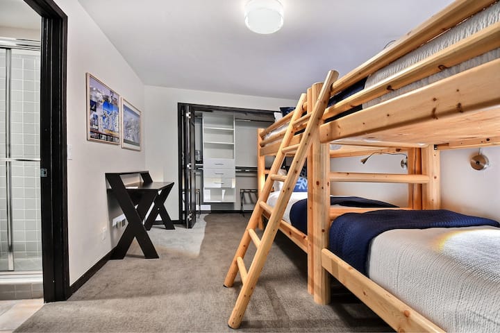 Quad twin bunk beds in the bunk room make it a kids dream to chat with their siblings or friends about their ski adventures of the day.