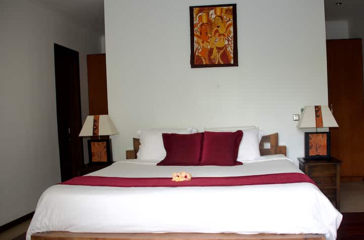 Bedroom 2. Ensuite with King size bed, spacious wardrobe area and work table.