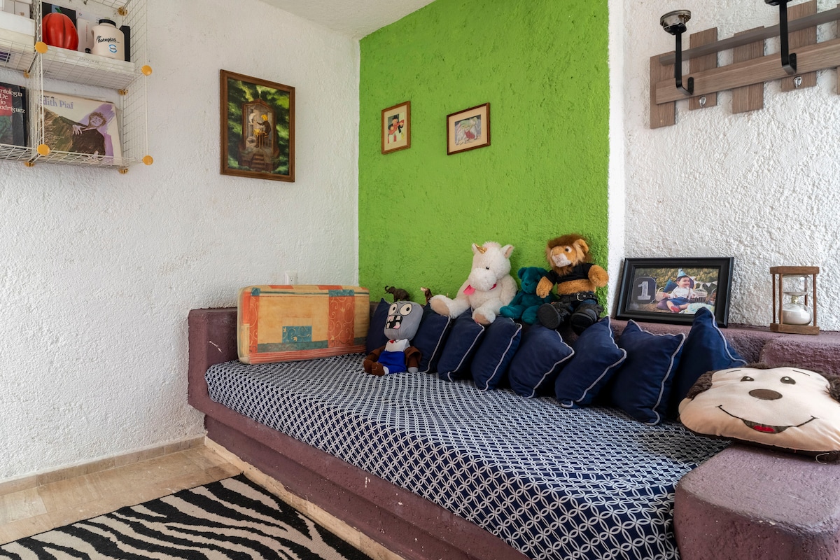 THE THIRD BEDROOM HAS A SINGLE BED, AND CAN ALSO BE USED AS A STUDY OR WORK SPACE