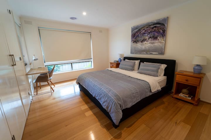 Bedroom 1 - King bed and desk with a view