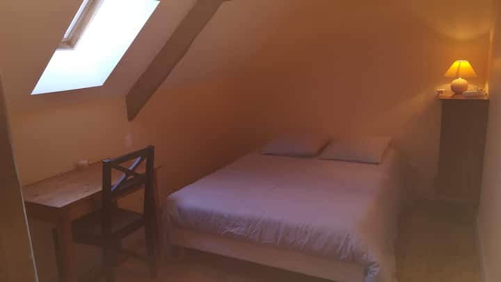 Yellow bedroom on the 2nd floor