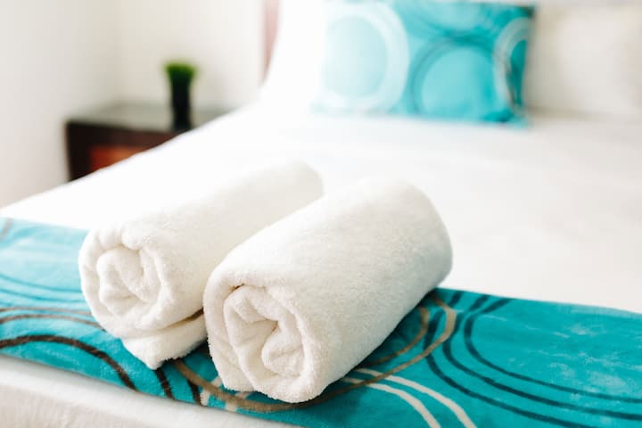 Luxury home just 7 min from Playa del Carmen beach! Sleeps 10, 3 bedrooms + sofa bed. Fully equipped kitchen, WiFi, A/C, towels, and parking. Car rental option with insurance and unlimited miles