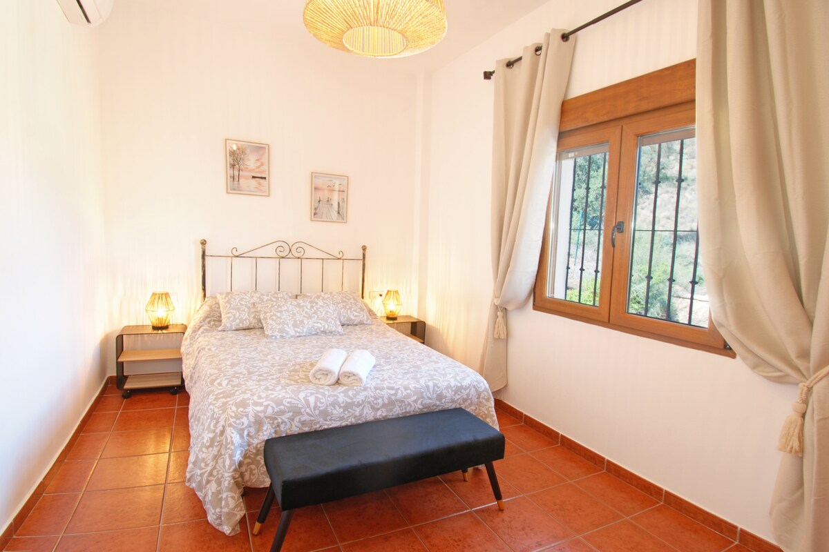 One of the 4 bedrooms upstairs