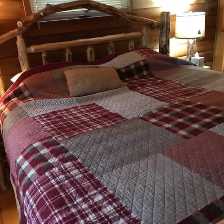 The main bedroom features a king bed, dresser, and closet space.