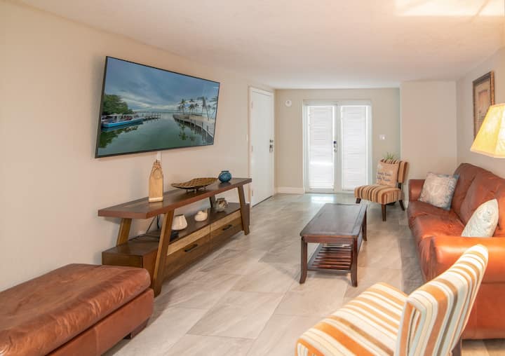 First floor living room, which has pullout sofa-bed.  This area can become a 4th bedroom very easily.