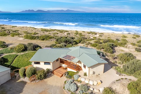 Secluded beach front retreat with a heated pool