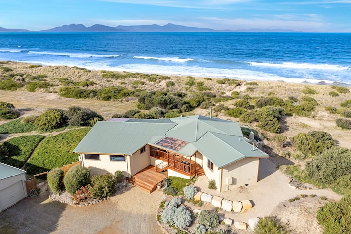 Secluded beach front retreat with a heated pool