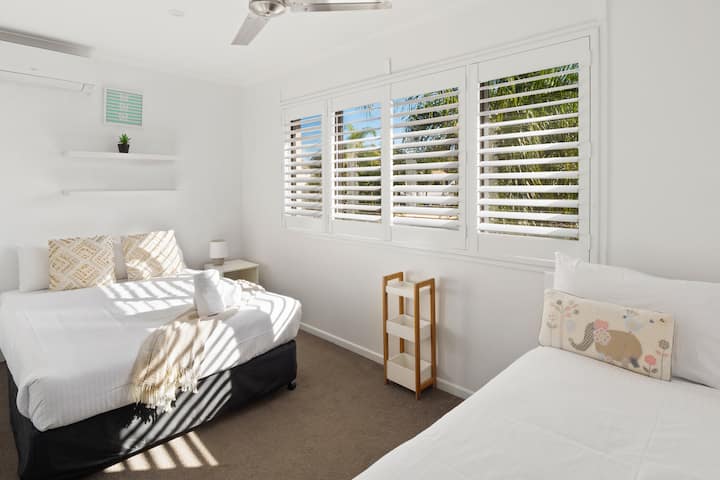 The second bedroom offers a double and a single bed, great for families and groups. Cooling ensures your year round comfort.