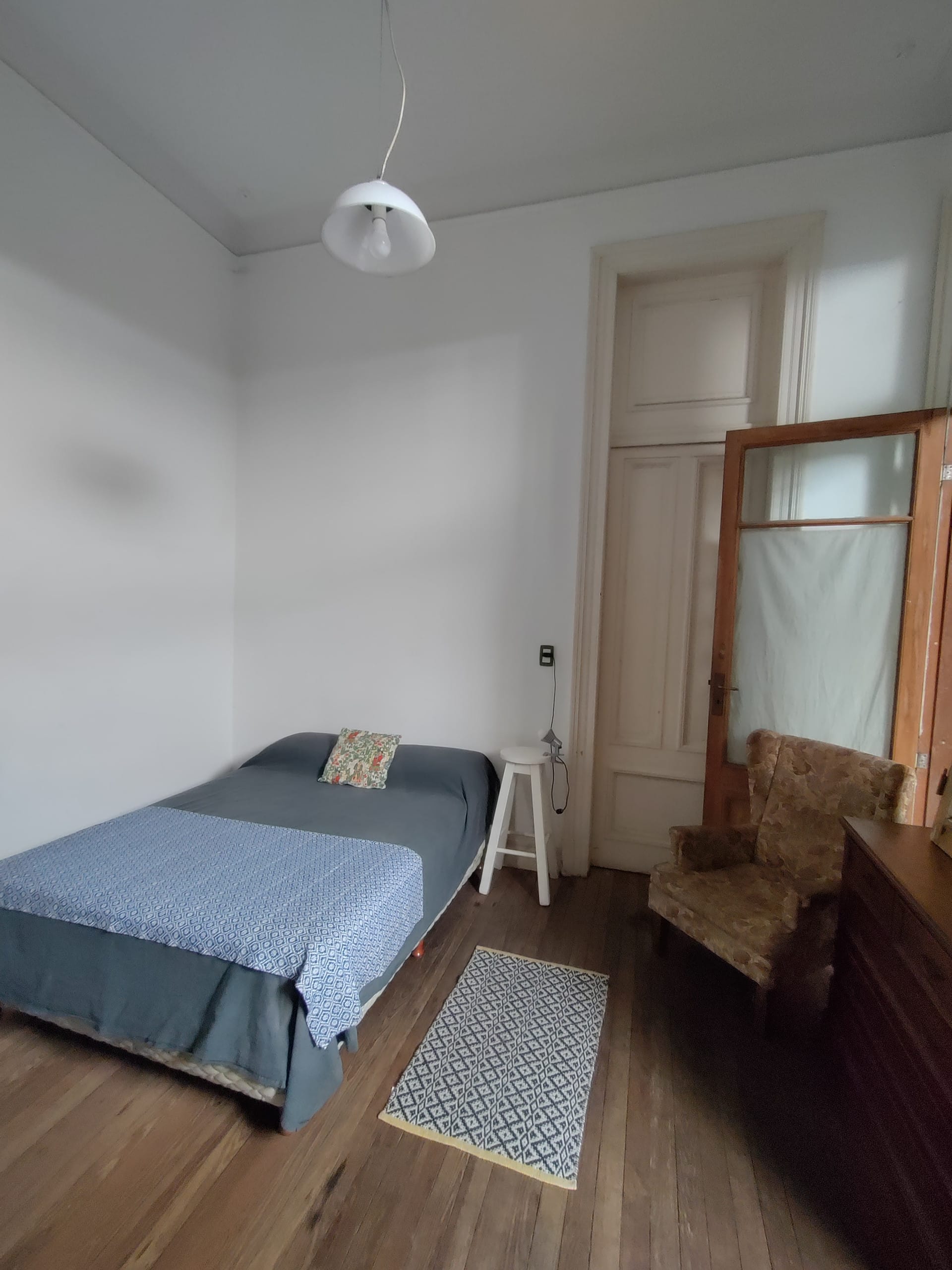Bedroom with private access to patio in San Nicolás apartment