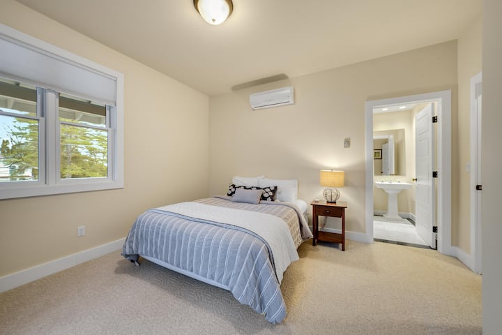 The second of our two queen bedrooms, with an attached full bathroom!