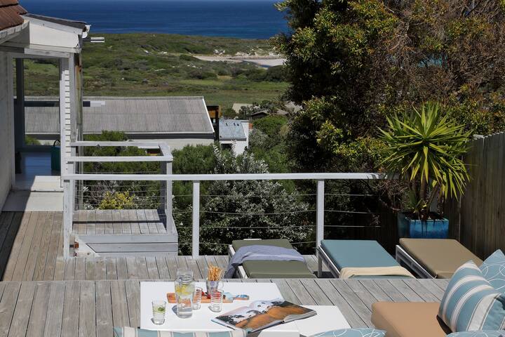 Walk to the Beach from a Stylish Home with Marvelous Views gallery image 5