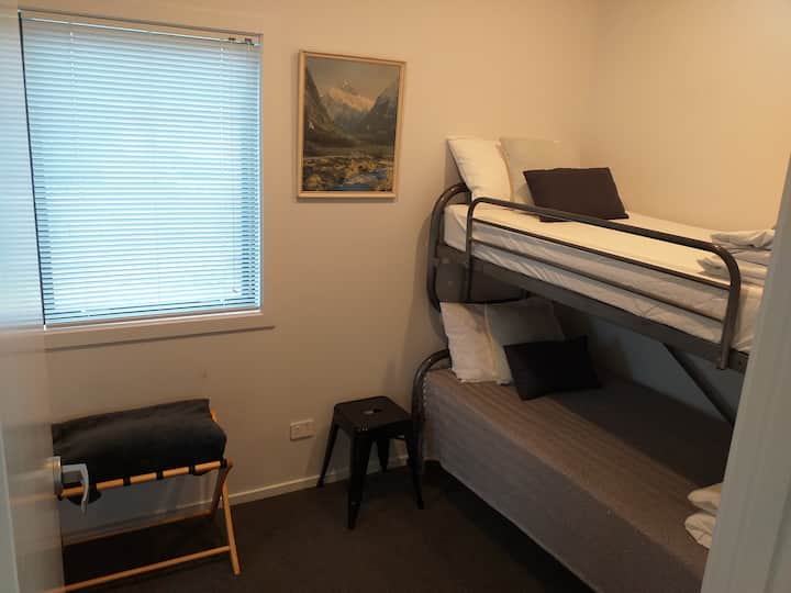 The small bedroom has a bunk bed with comfortable mattress. These bunks do not squeek! 
