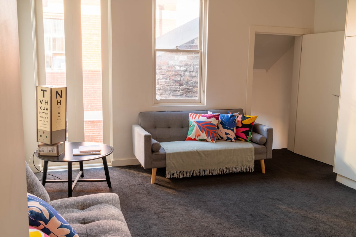 Second Living space , a cozy space to relax and watch TV, with two sofa beds for additional guests.