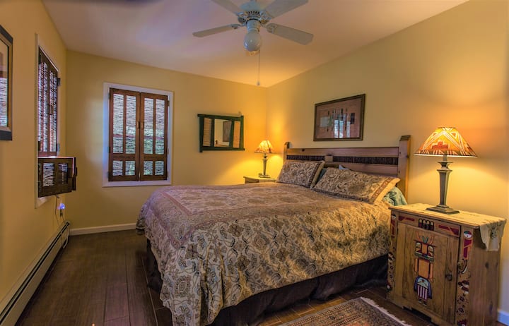 The second bedroom has a king size bed with southwestern accents.