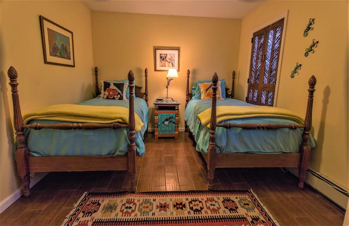 Our third bedroom is very colorful with two twin size beds.