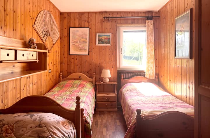 The children's room with three single beds. 