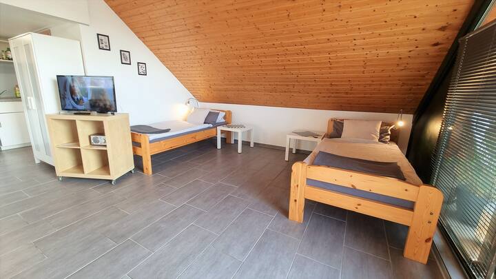 Zona e fjetjes në apartamentin Lohe.