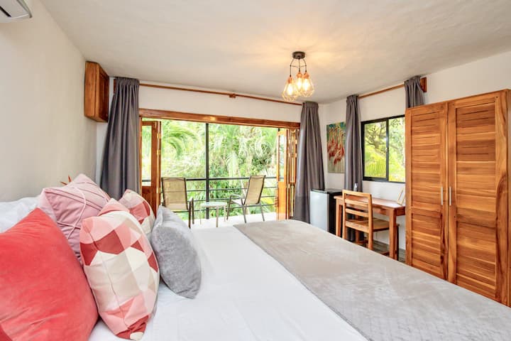 The Pool House bedroom has a closet, desk with chair, and mini bar fridge. The Pool House bedroom only becomes available when the villa is booked for 3 to 4 guests. Otherwise, this room remains locked and unavailable during your stay. 