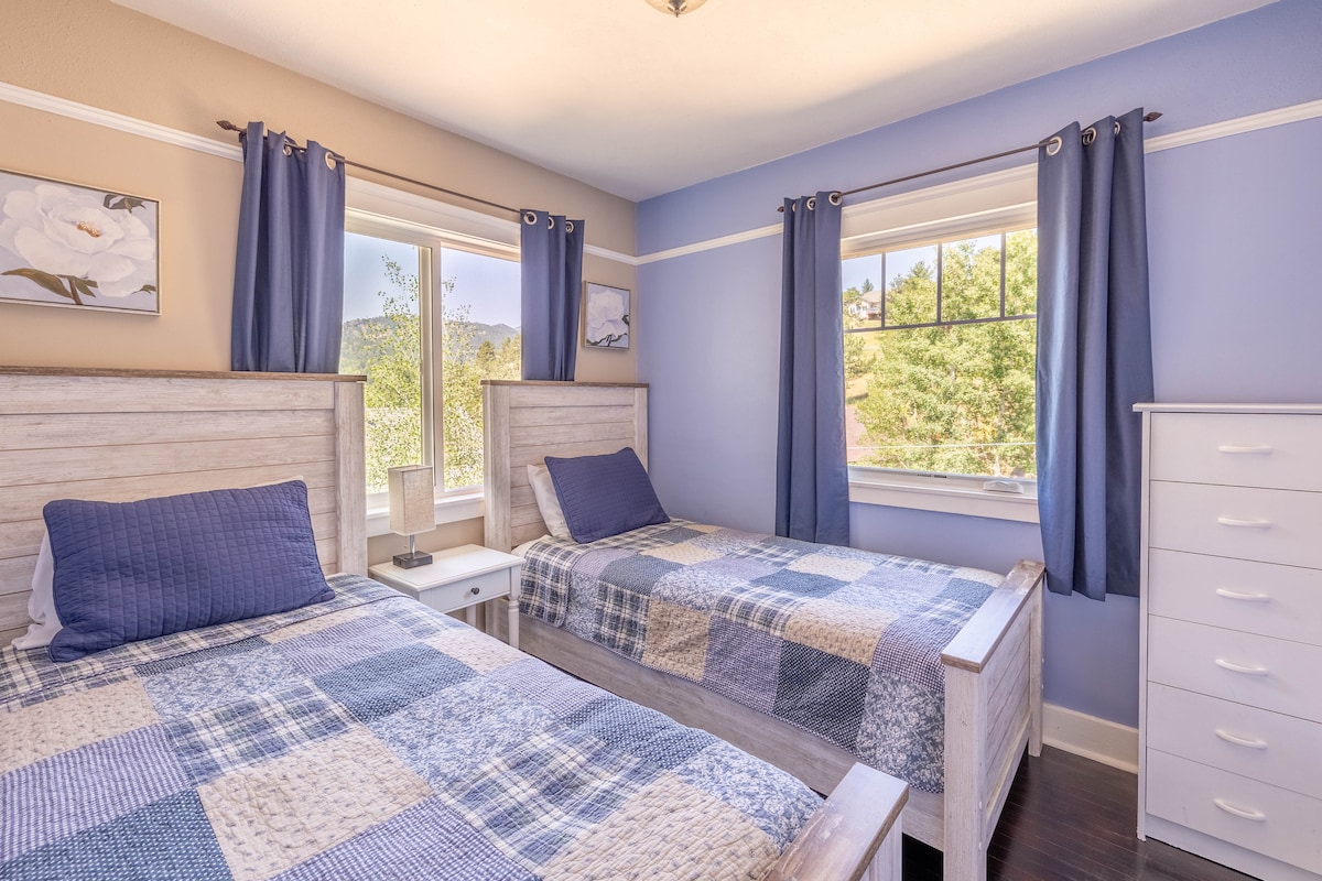 Segundo dormitorio con dos camas individuales.