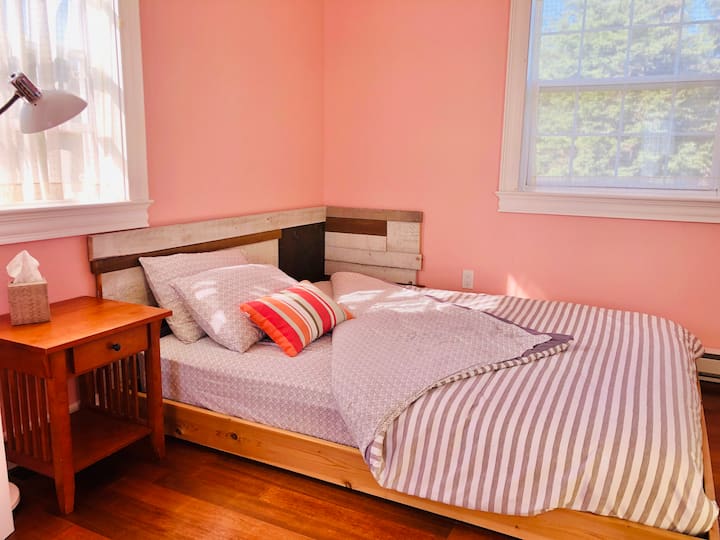 Crew bedroom #2 - this room is on your right at the top of the stairs - not facing the ocean, and has a low platform, queen bed.