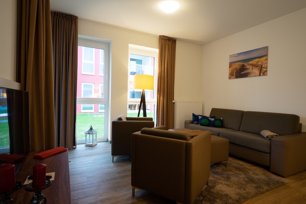 Erfolgreiche Airbnb-Immobilie: Apartment right on the ocean with pool and sauna in Schleswig Flensburg