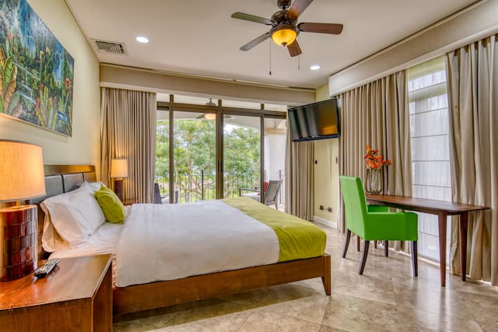 Large Master Bedroom Suite with Private Bathroom and workstation.