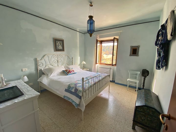The Blue room, sunrise and village view on the hilltop