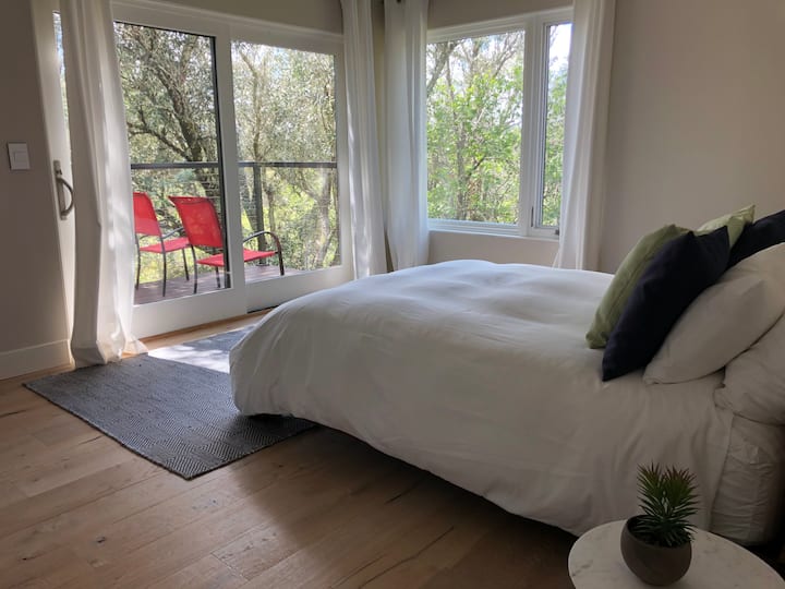 Bedroom with sliding door to the deck