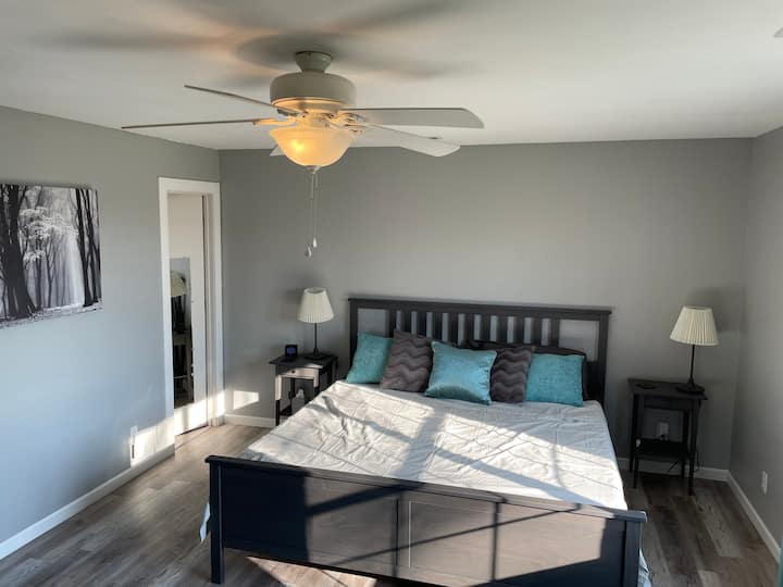 Our primary bedroom suite is ready to lull you into a deep slumber.