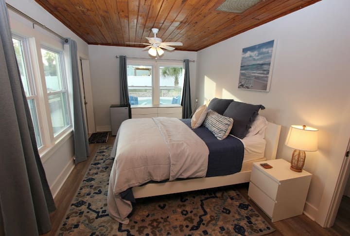 Master Bedroom.  Access door to pool. 